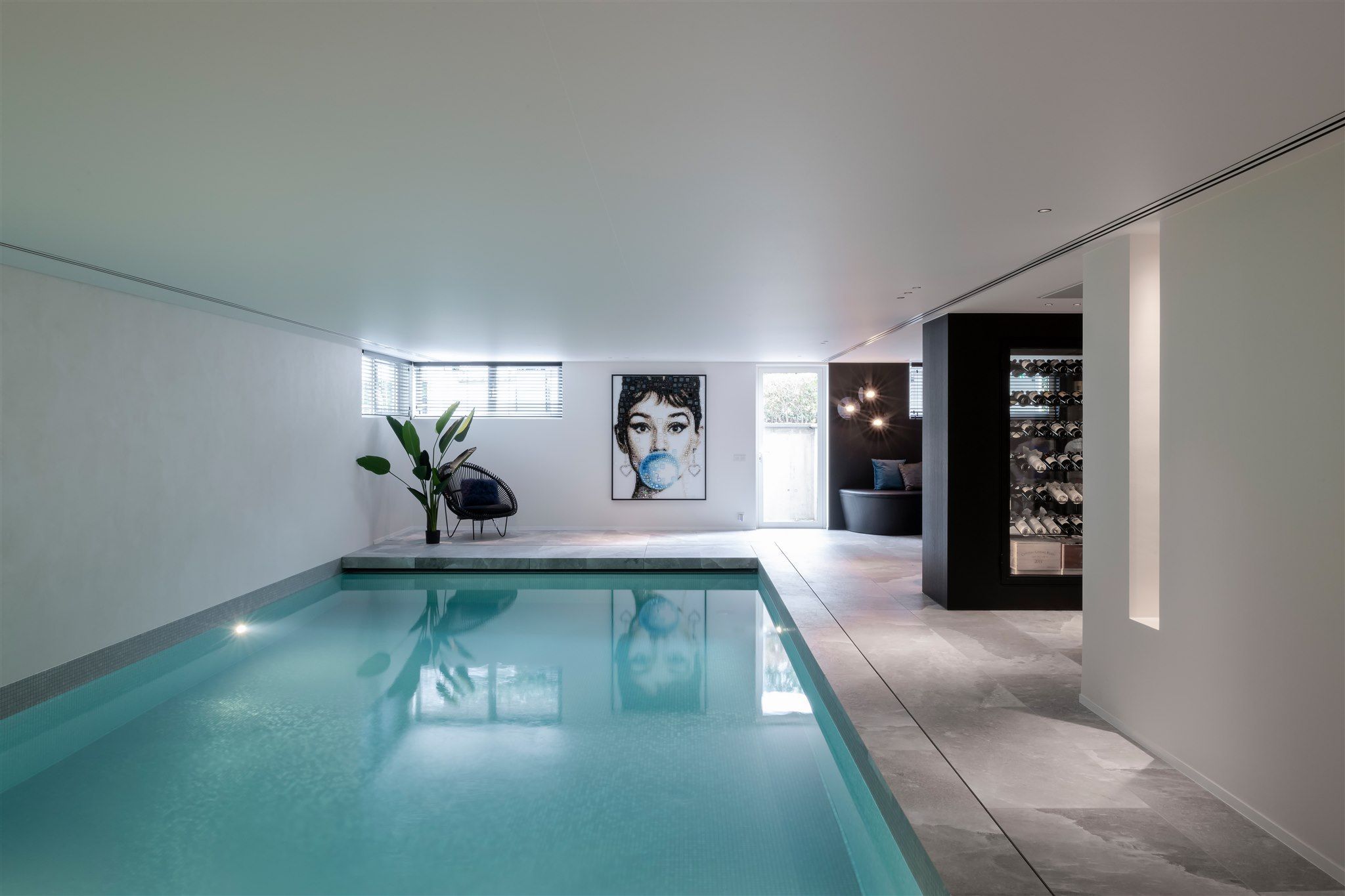 Lounge met zwembad en poolhouse - Wortegem-Petegem | Florence Ghyselen Interieurarchitecten